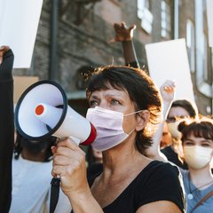 diverse-people-wearing-mask-protesting-during-covid-19-pandemic-1536x1024